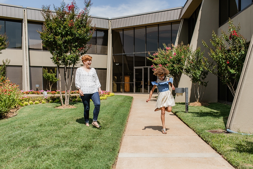 ONE Blog Post9 Women and girl walking on sidewalk