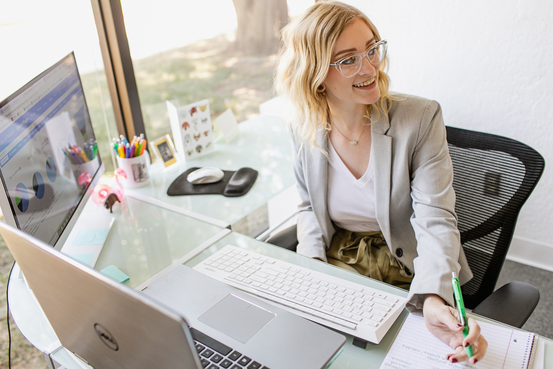 ONE Central Office banner Woman at desk