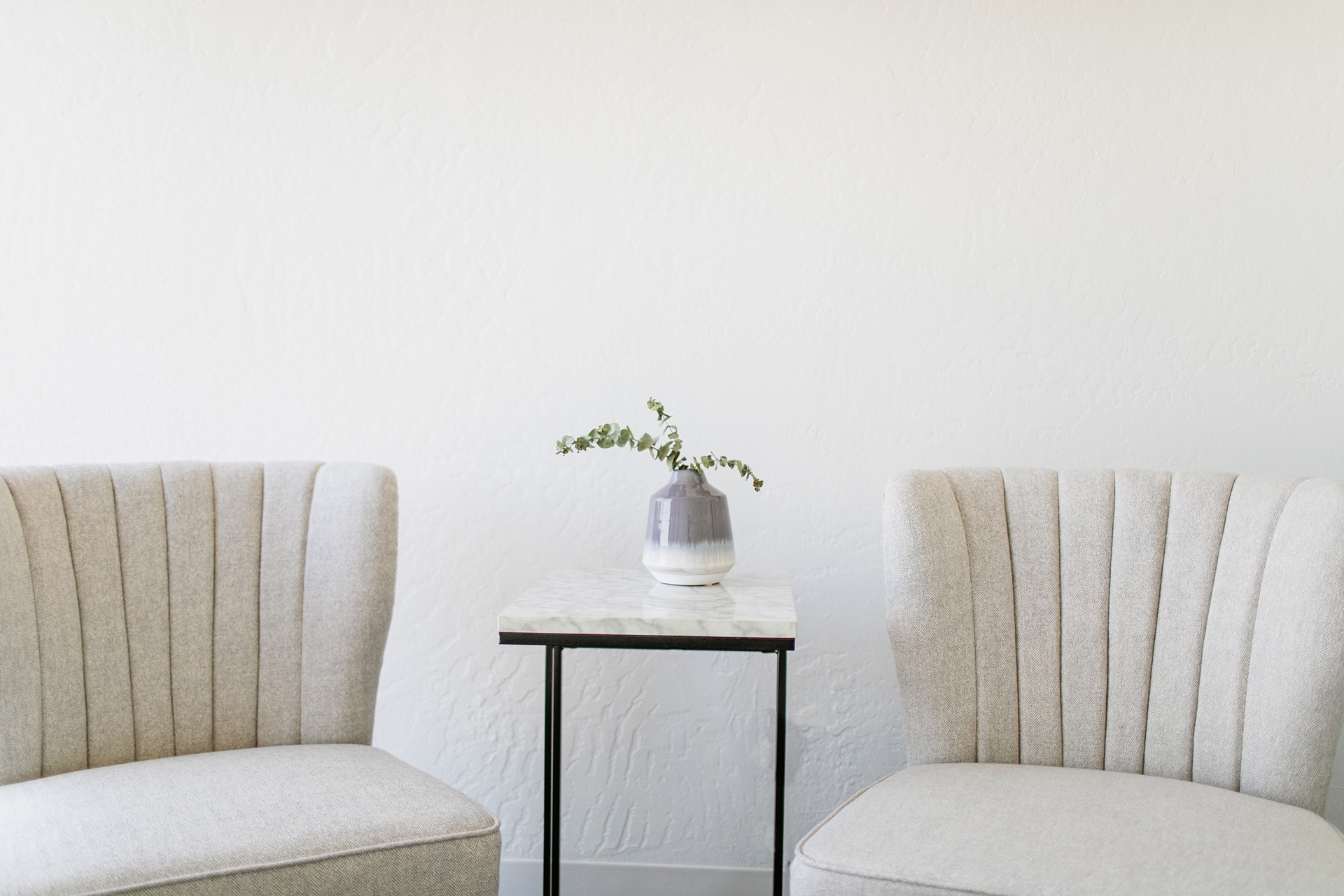 ONE Home Learn More Two empty chairs