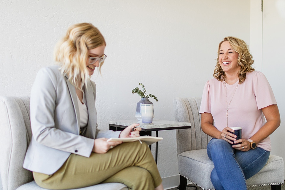 ONE Member Benefits Community Two women in chairs